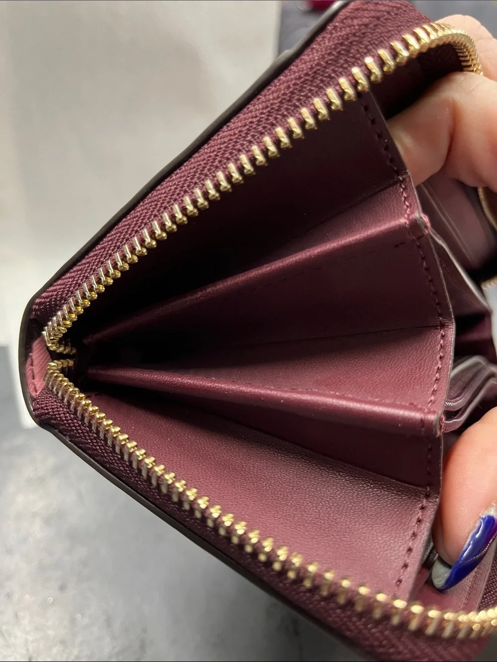 NWOT Kate Spade pink floral on dark maroon zip-around wallet